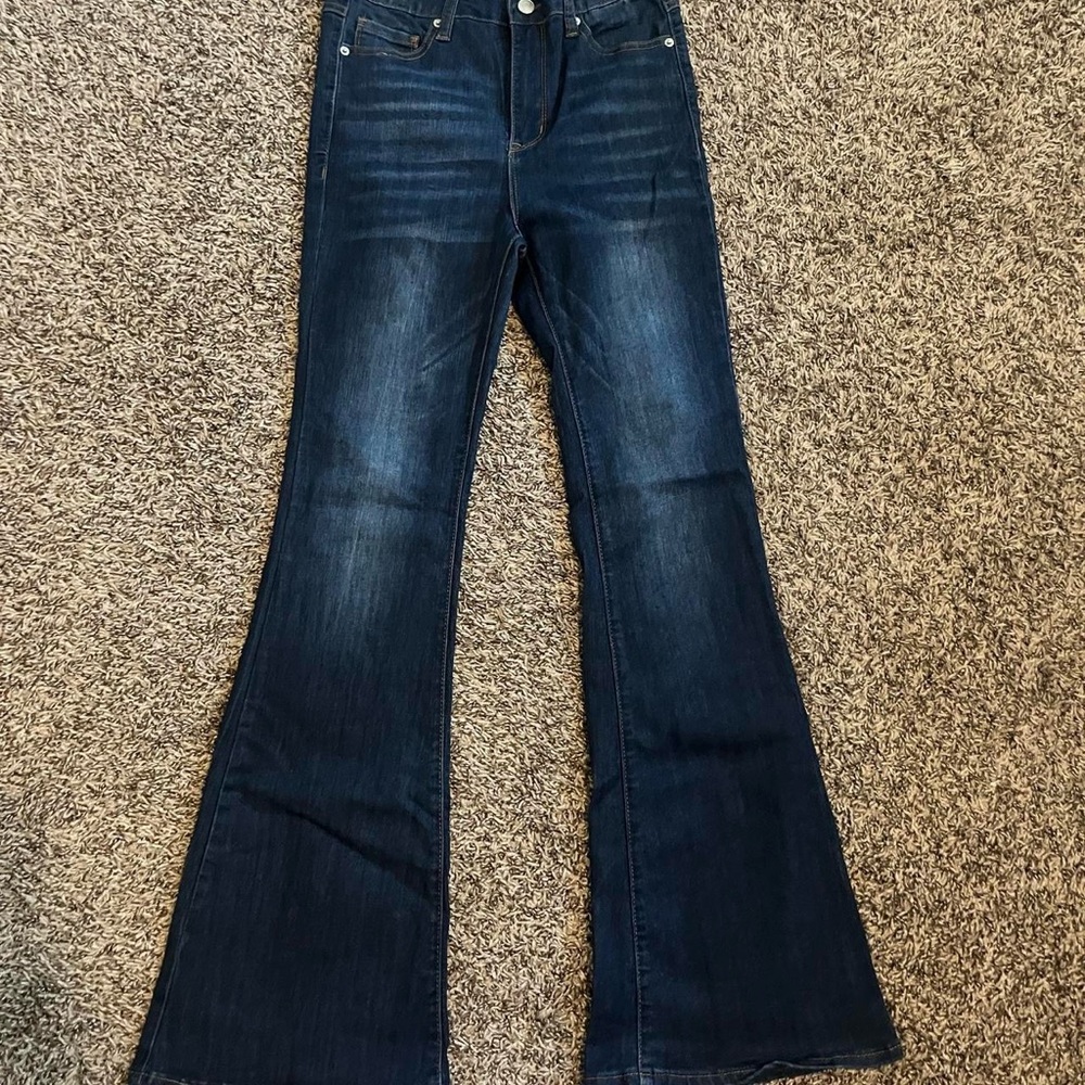 Dark wash flare lace up back jeans